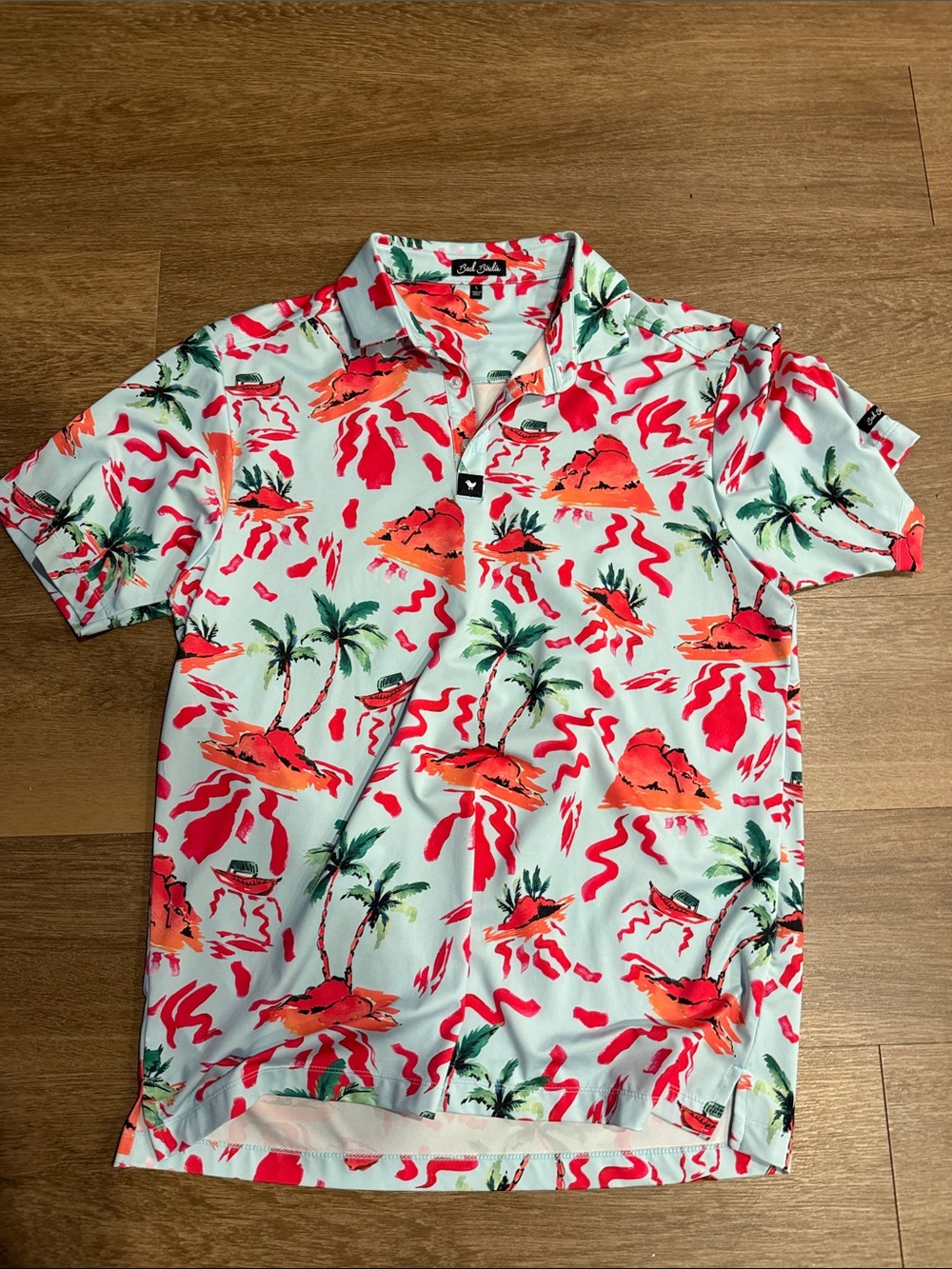 Bad Birdie Mint Polo with Coral Orange Island Print